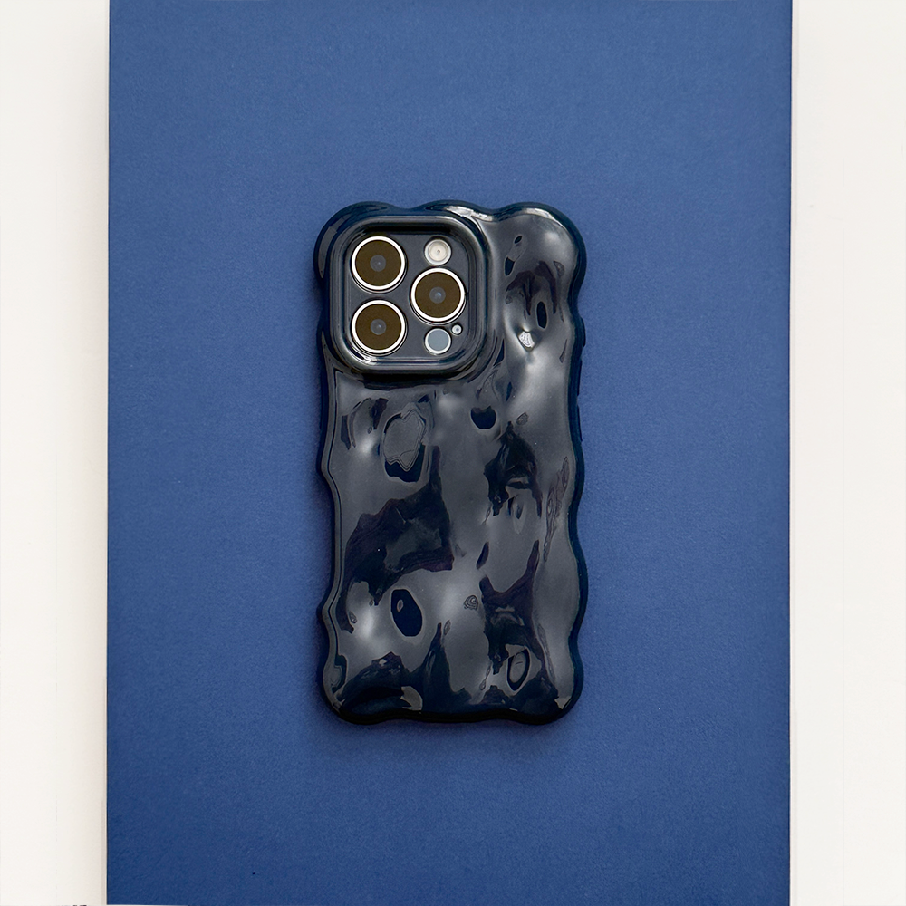 Navy Coconut Lane 3D Bubble phone case on a blue surface.