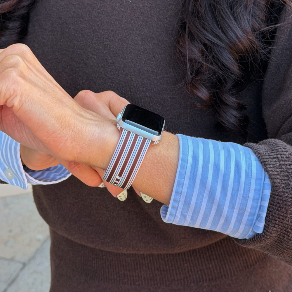 Girl wearing Brown and Blue Watch Strap with matching outfit