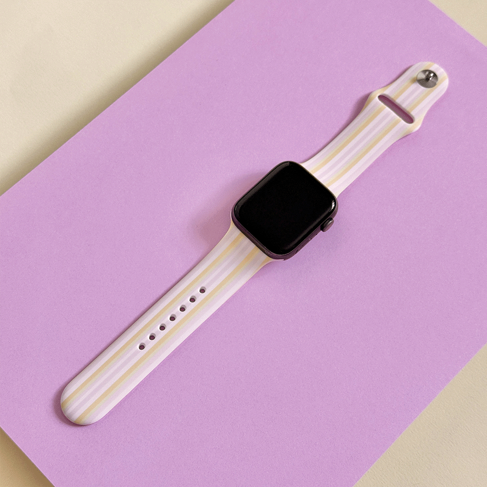 Apple Watch on lilac background showcasing Pastel Stripes watch strap.
