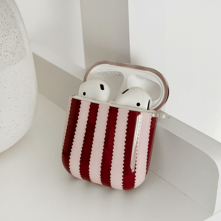 Burgundy and light pink striped protective case for Apple AirPods.