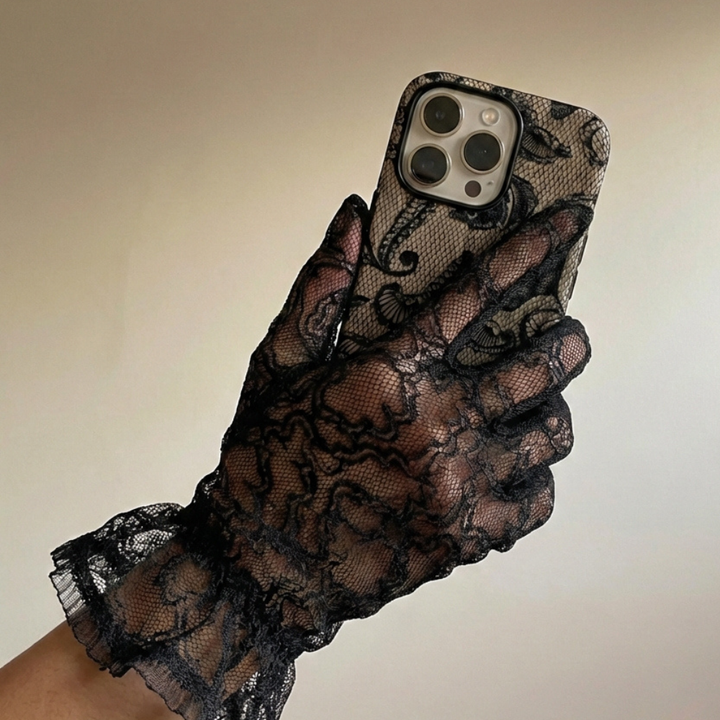 Black Lace Tough Phone Case held elegantly with a black lace glove