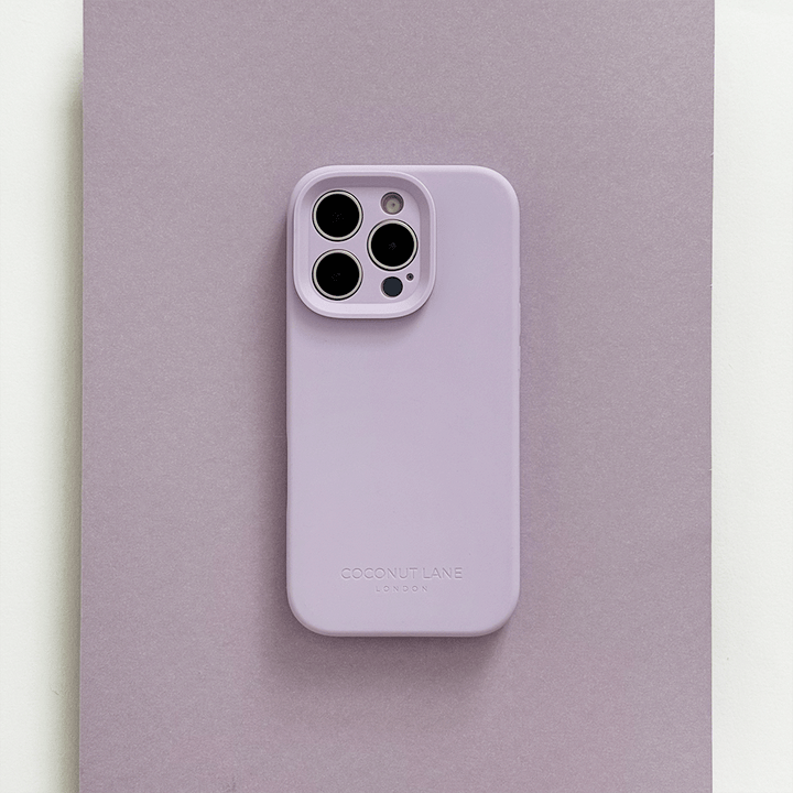 Lilac Phone Case with 'Coconut Lane' branding on a pink background.