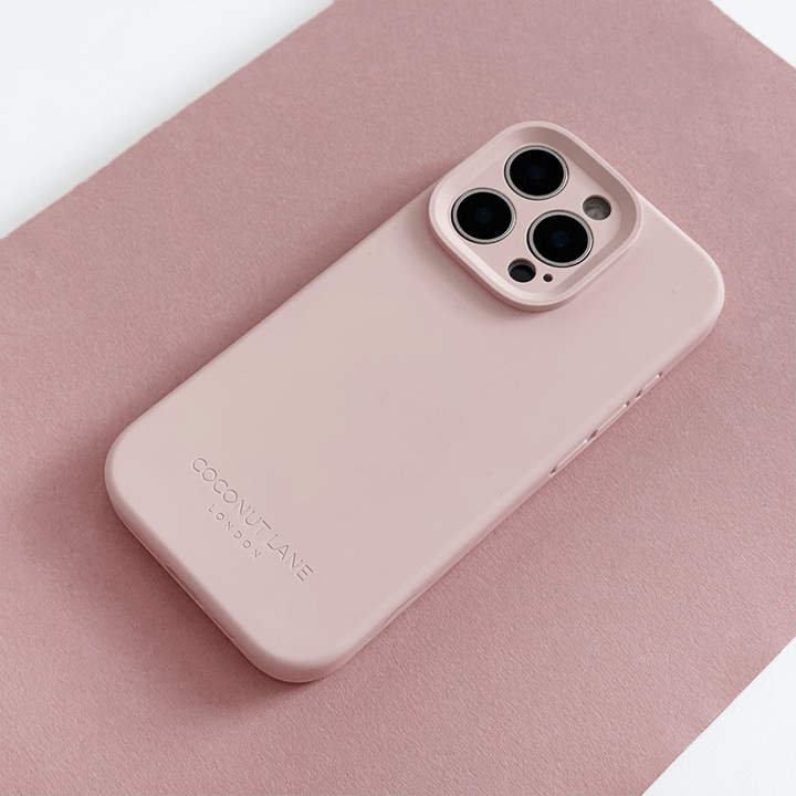 Pink Phone Case with 'Coconut Lane' branding on a pink background.