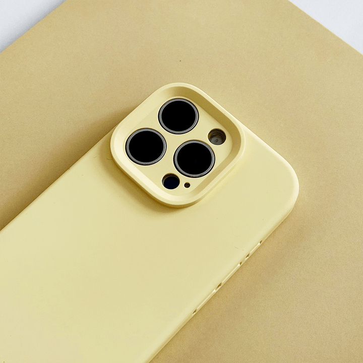 Yellow Phone Case with 'Coconut Lane' branding on a pink background.