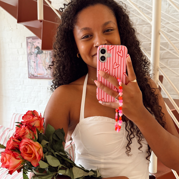 Girl smiling holding phone case