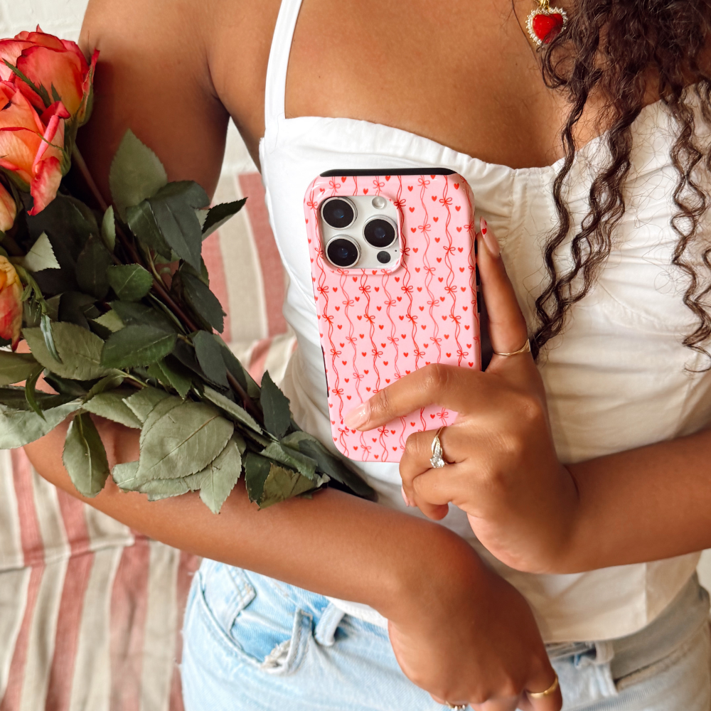 Girl holding Love Tied Phone Case