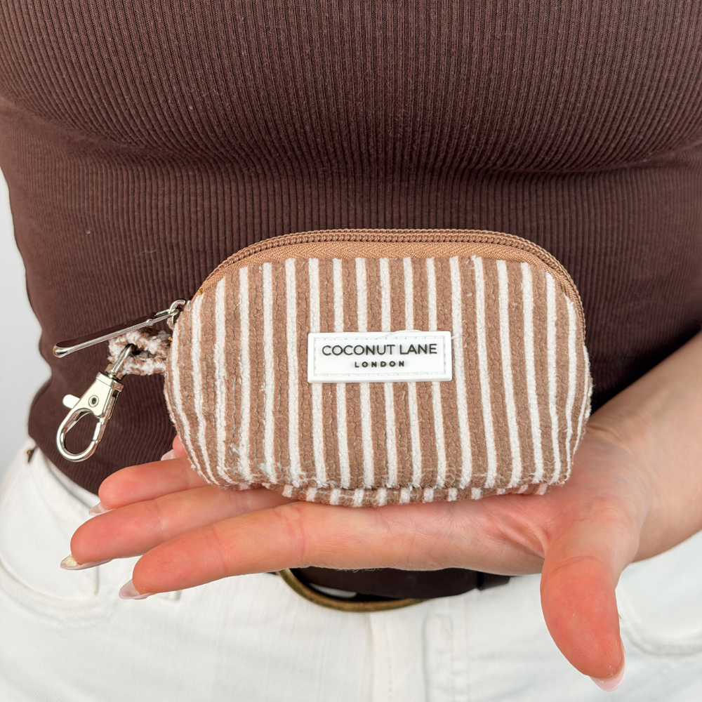 Close up of mini towel keyring bag chestnut stripes