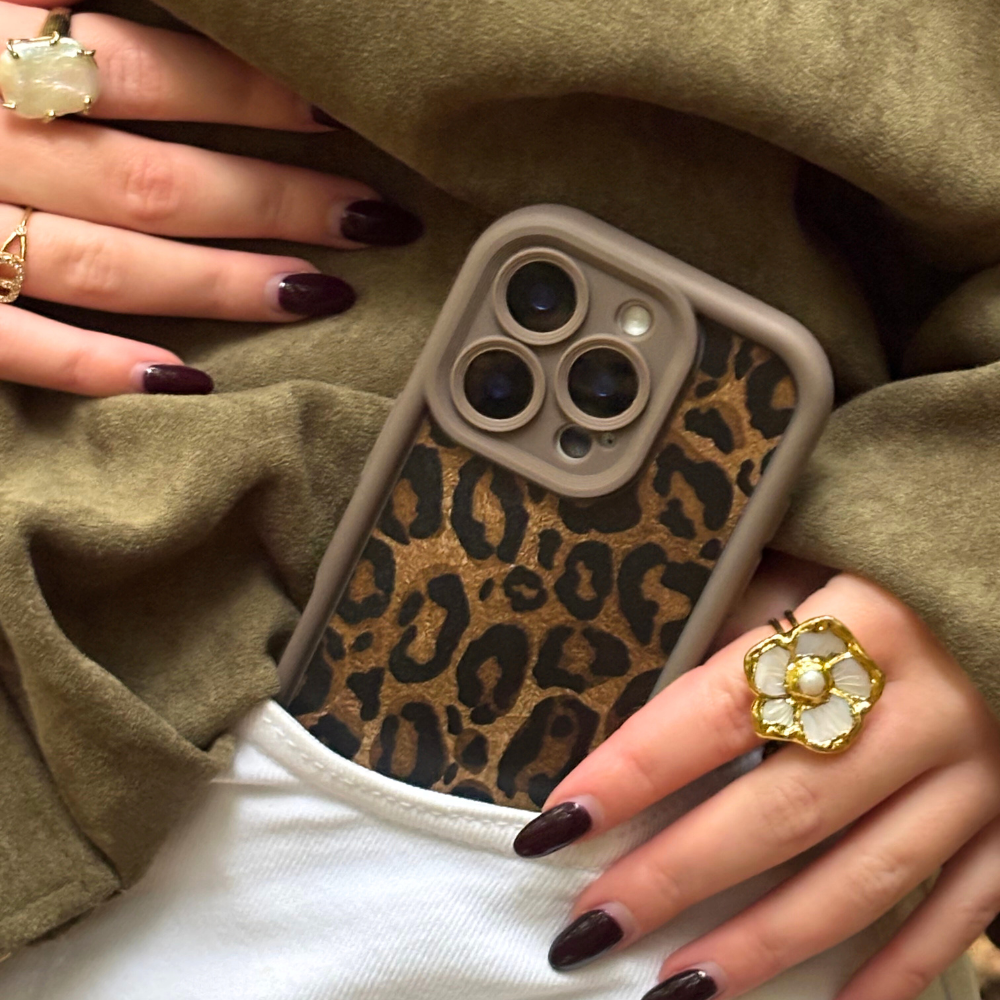 mocha leopard phone case in white jeans pocket