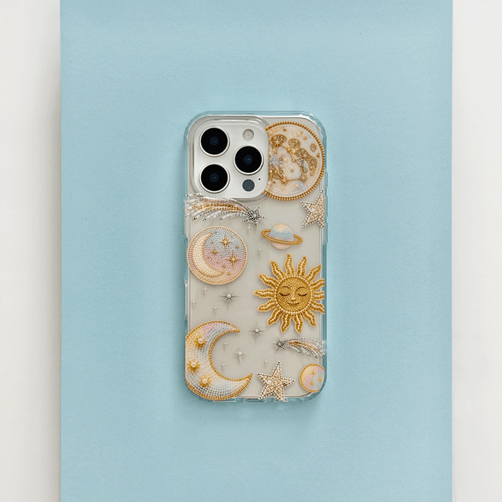 Clear Phone Case with celestial illustrations; stars, space, moon and sun.
