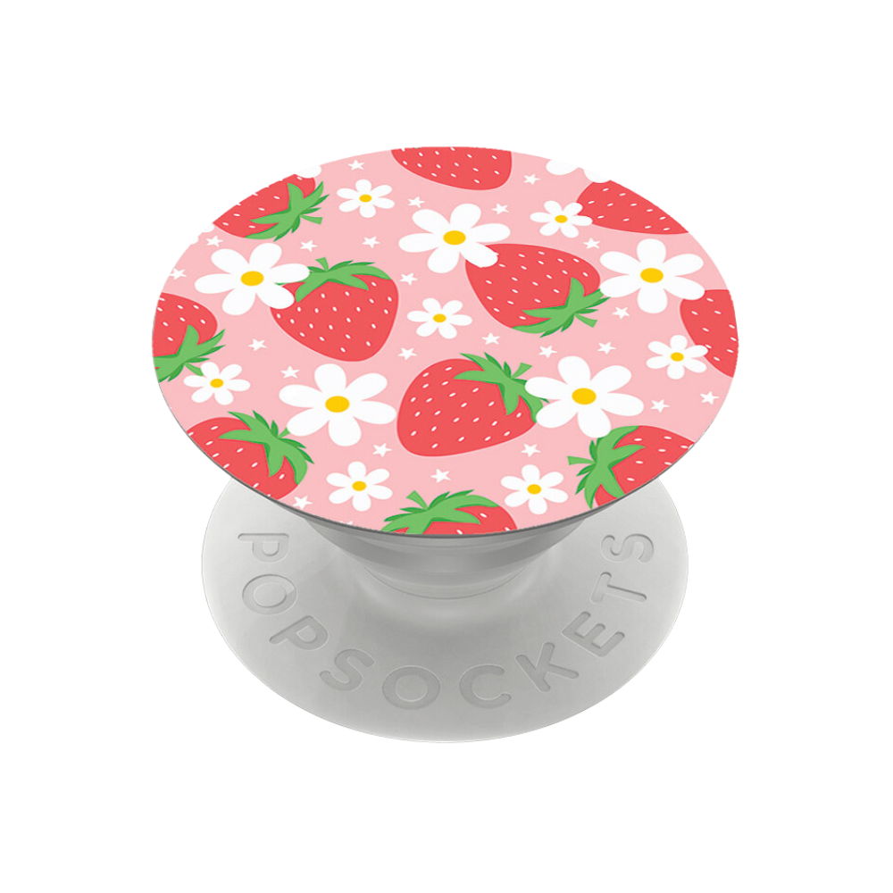 The PopSocket Grip - Berry Cute Strawberry by Coconut Lane is a delightful phone accessory featuring a round top adorned with red strawberries and white flowers with yellow centers on a pink background. The white collapsible grip and stand provide both style and a secure hold, with "PopSockets" embossed around the base.
