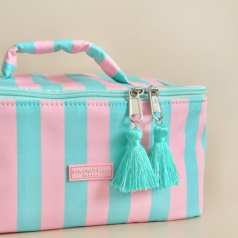 Blue and pink stripe Vanity Case, with tassels and padded handle.