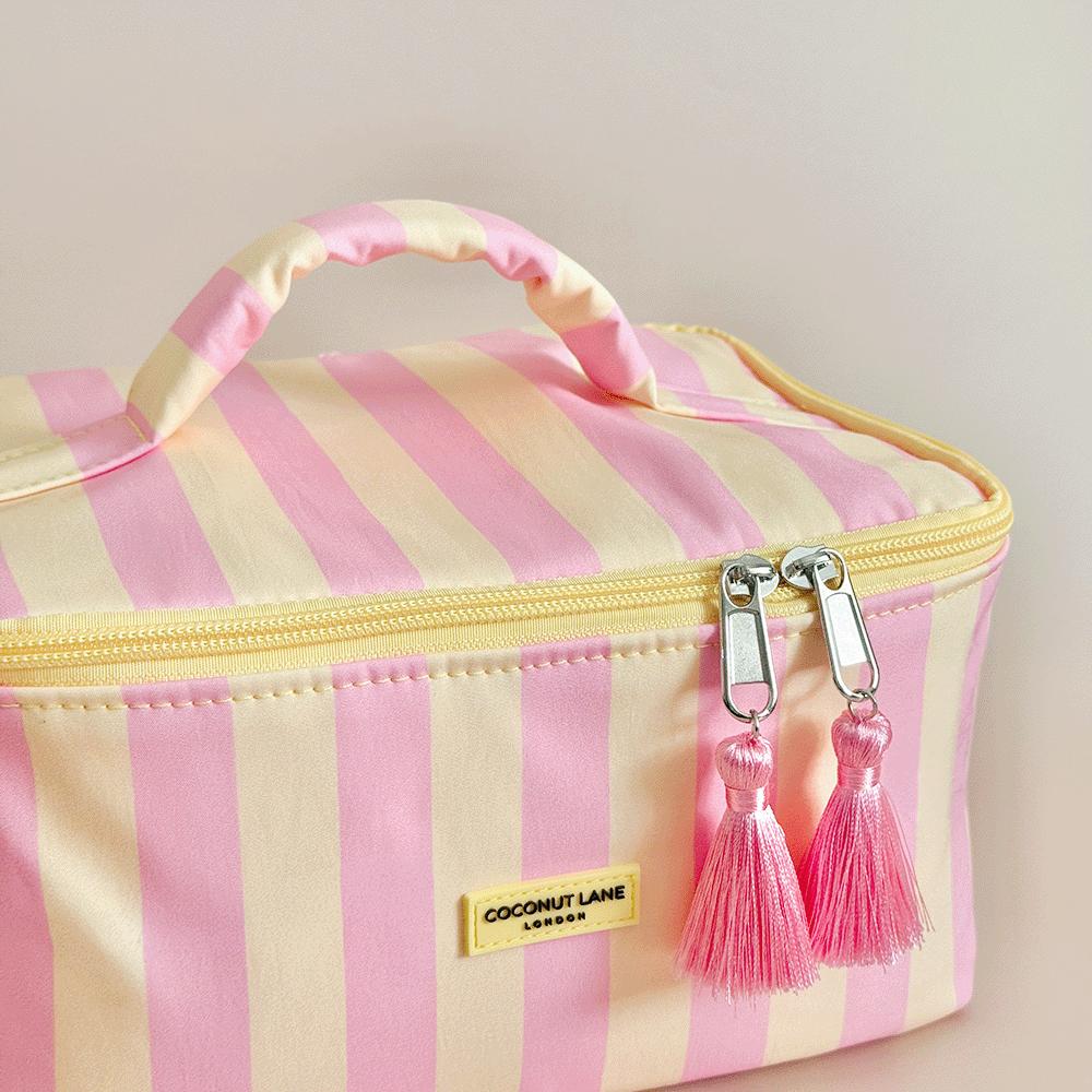 Yellow and pink stripe Vanity Case, with tassels and padded handle.
