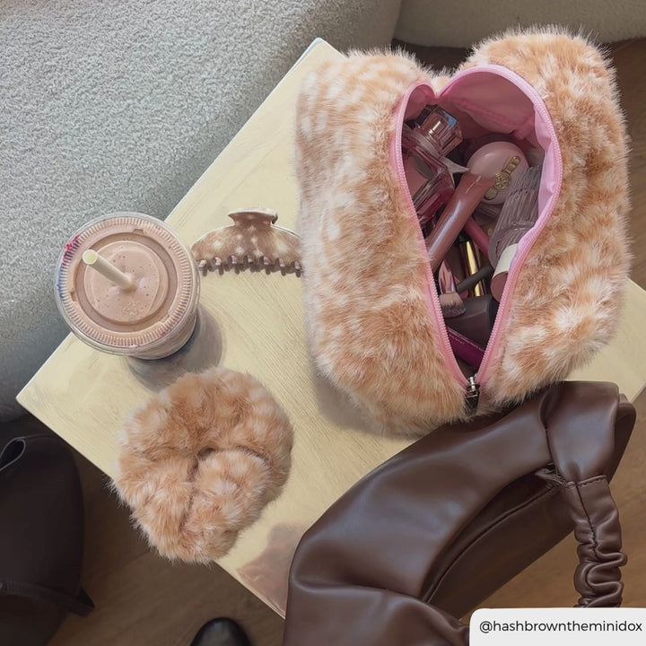 table featuring matching fawn print scrunchie, clap clip and makeup bag