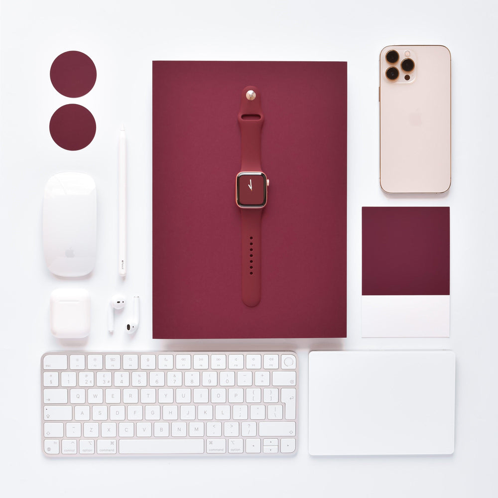 wine-purple-apple-watch-strap-surrounded-by-apple-technology